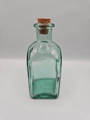 Vintage green glass bottle with cork stopper, 4.5 inches tall