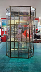 Vintage hexagonal glass curio cabinet with brass trim and etched floral design, 15 inches tall