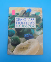 Sea Glass Hunter’s Handbook hardcover by C.S. Lambert, 2010 edition with tips and photos for identifying and collecting sea glass.