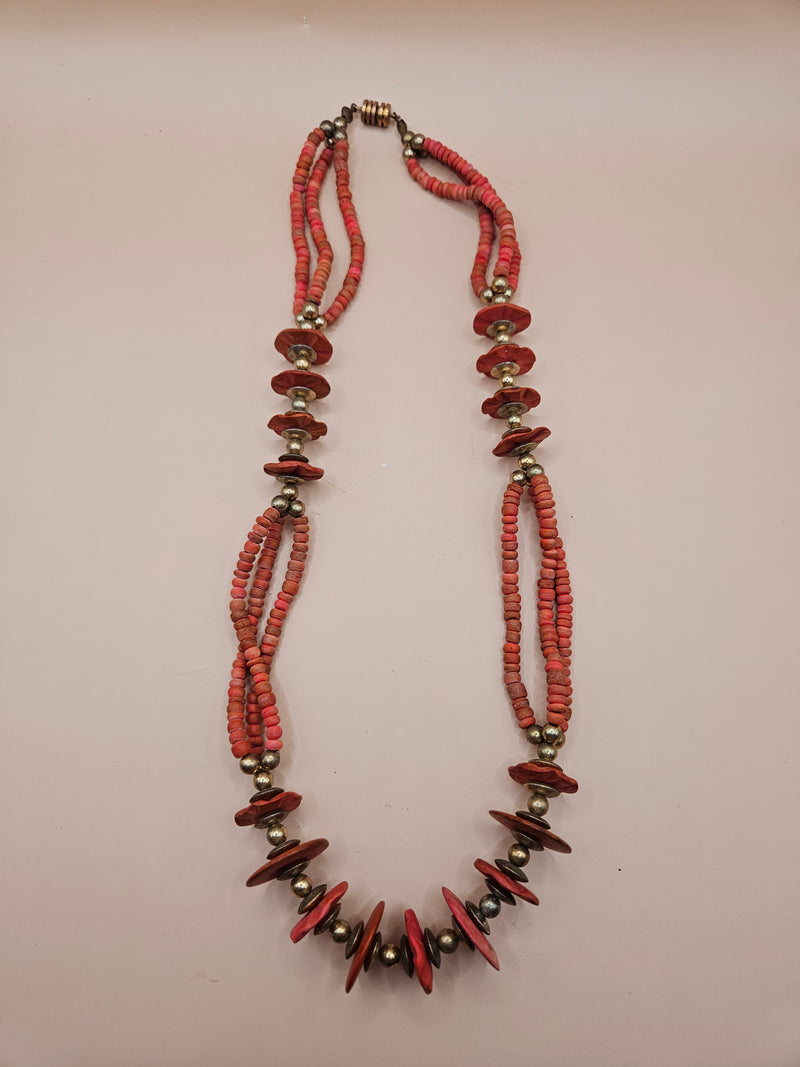 A 12.5" vintage Art Deco red bead necklace featuring bold red beads and a secure clasp, perfect for adding timeless