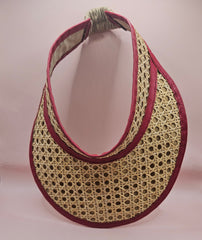  woven rattan visors with faux leather trim in black, red, green, and brown