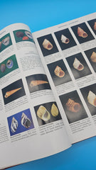 Compendium of Seashells hardcover book by R. Tucker Abbott and S. Peter Dance, 1991 edition with over 4,200 full-color marine shell photographs.