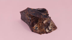 Rough Deschutes Jasper specimen with scenic brown and gold banding, 38g collector’s stone from Oregon shown in hand.