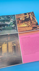 Ultimate Tropical hardcover book by Luca Invernizzi Tettoni, Rizzoli 2009 edition with photography of luxury tropical resorts and villas.
