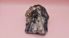 Close-up photo of dendritic opal rough specimen showing black fern-like mineral inclusions in milky-white and gray matrix, 304 grams.