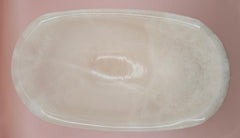 Polished white onyx bowl with smooth curves and a subtle translucent glow, measuring 9.75 inches.