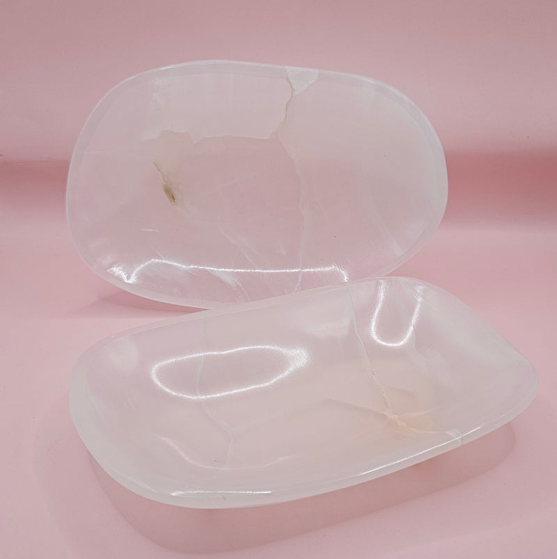Polished white onyx dish with subtle marbling