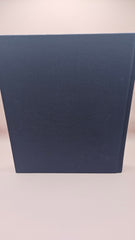 vintage hardcover book The Book of Texas Bays by Jim Blackburn, dark blue with gold text, published by Texas A&M University Press.