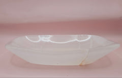 Polished white onyx dish with subtle marbling