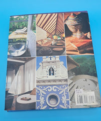 Ultimate Tropical hardcover book by Luca Invernizzi Tettoni, Rizzoli 2009 edition with photography of luxury tropical resorts and villas.