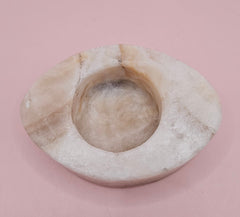 Oval-shaped onyx candle holder in white and brown natural stone, 3.7x2.6x1.2 inches