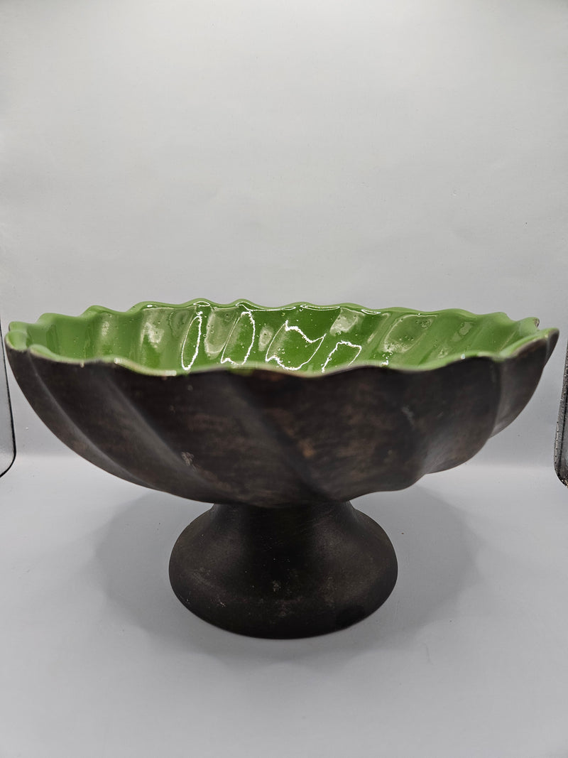 green ceramic scalloped footed bowl measuring 4.75"x8.5", perfect as a decorative centerpiece or functional bowl in any room.