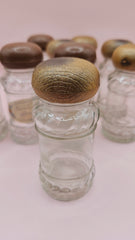 Set of 9 vintage clear glass spice jars with wood-look plastic lids, 3.8 inches tall