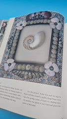 Shell Chic hardcover book by Marlene Hurley Marshall, coastal décor guide featuring seashell-decorated projects, photography by Sabine Vollmer von Falken, 2002 Storey Publishing edition.