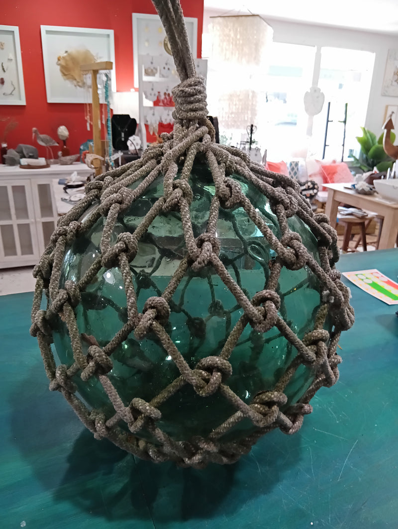 Authentic vintage green glass float with hand-tied rope netting – coastal decor accent