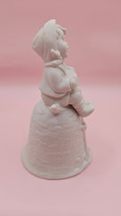 Unpainted vintage ceramic bisque bell featuring a boy with accordion sitting on a tree with bird detail, Provincial Mold #P-447, 4.8x2.8 inches.