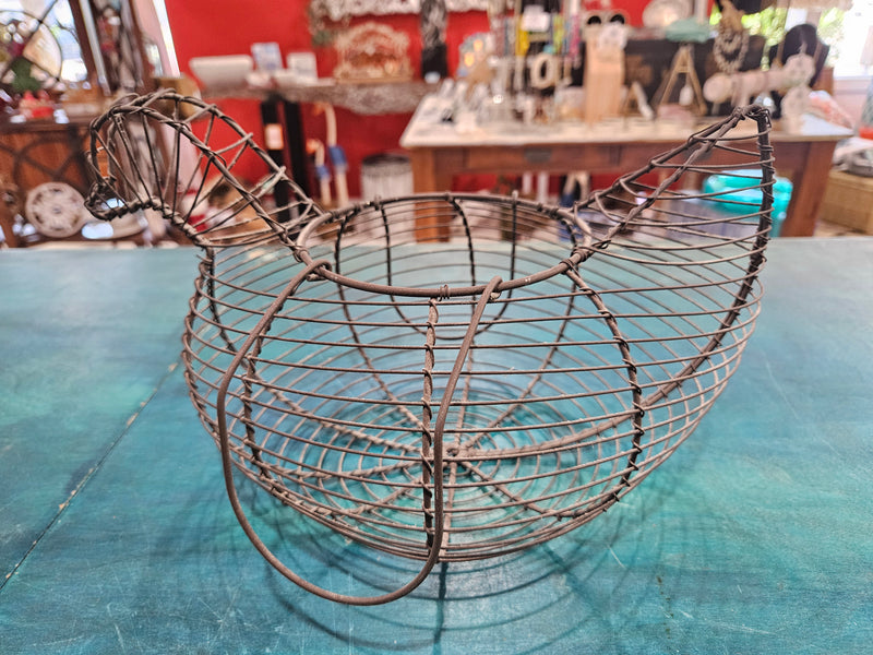 Vintage metal wire egg gathering basket in the shape of a hen, measuring 11.5 inches by 8 inches by 7 inches, ideal for farmhouse decor