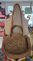round woven straw tote bags in beige, black, and brown 