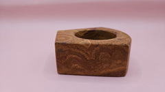 Curved-edge golden onyx candle holder with round tealight well and purple stone veining, 2.8x1.2 inches