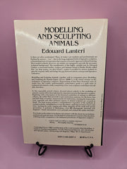  Back Cover of Modeling and Sculpting Animals by Edouard Lanteri showcasing a guide to animal anatomy and figure sculpting