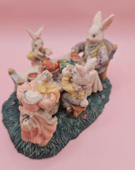 Vintage bunny figurine of rabbits at dinner table, pastel painted with one head missing, 4.3x3.2, collectible Easter decor