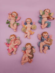 intage angel cherub magnets, each playing different instruments like cymbals, flute, and violin