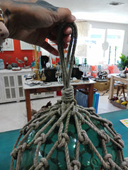 Authentic vintage green glass float with hand-tied rope netting – coastal decor accent