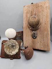 vintage door knobs made of brass and glass, beautifully designed to complement retro and vintage decor, placed against a rustic background