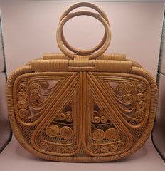 hardwood butterfly-shaped handbags in natural and dark finishes