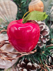 Vintage 2-inch red apple ornament with foam body, red coating, and green nylon leaves, ideal for holiday deco