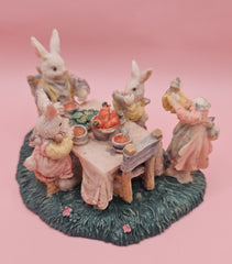 Vintage bunny figurine of rabbits at dinner table, pastel painted with one head missing, 4.3x3.2, collectible Easter decor
