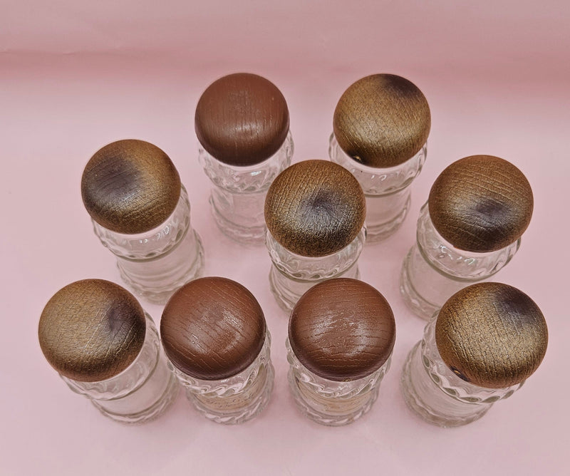 Set of 9 vintage clear glass spice jars with wood-look plastic lids, 3.8 inches tall
