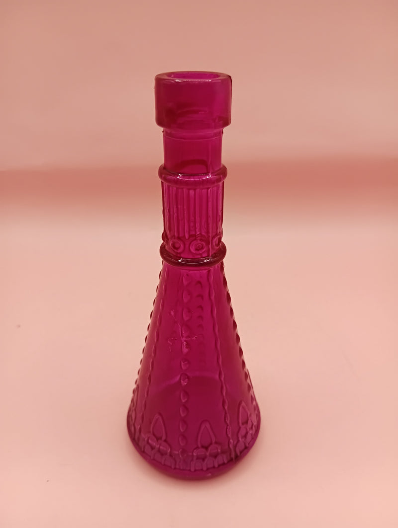 Miniature clear apothecary-style glass bottle with embossed design, no stopper, from Shell World