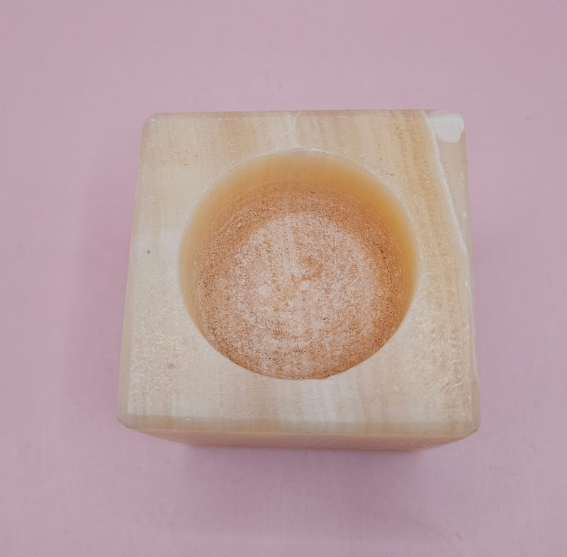 Square natural onyx candle holder with soft golden marbling, sized 2.4x2.4 inches