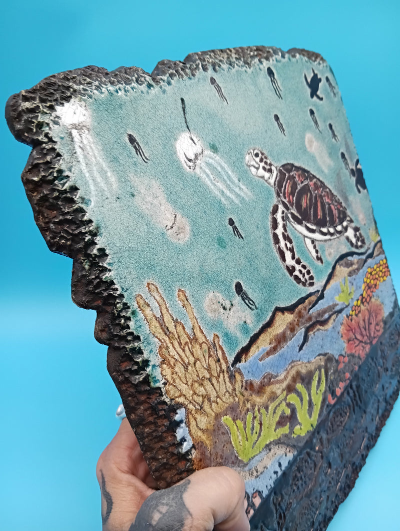 Handmade Raku fired ceramic sea turtle wall art by Bobbie McCrea, North Shore Pottery