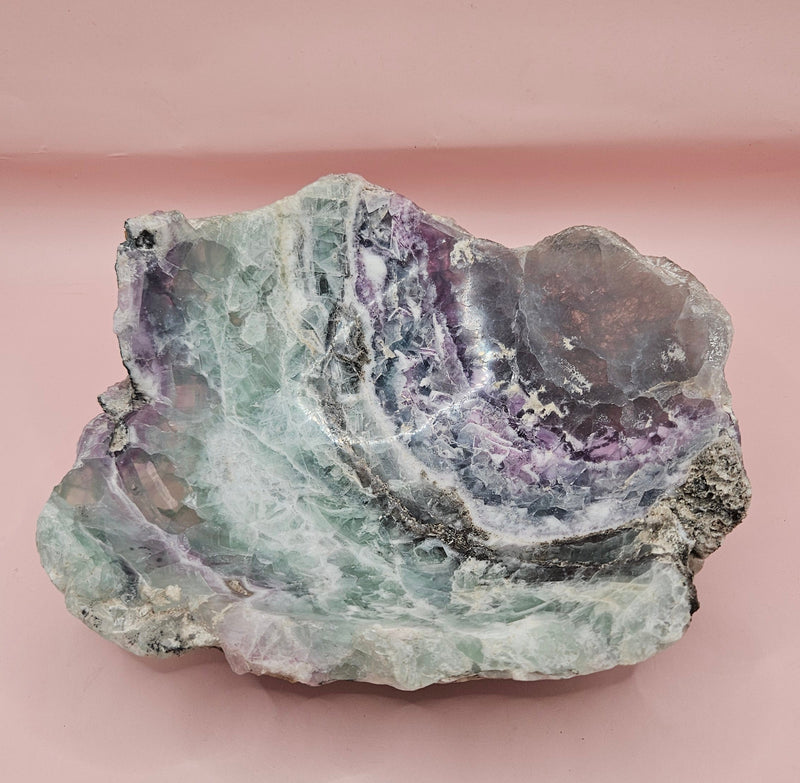 Polished fluorite crystal bowl with green banding, measuring 8 inches wide.