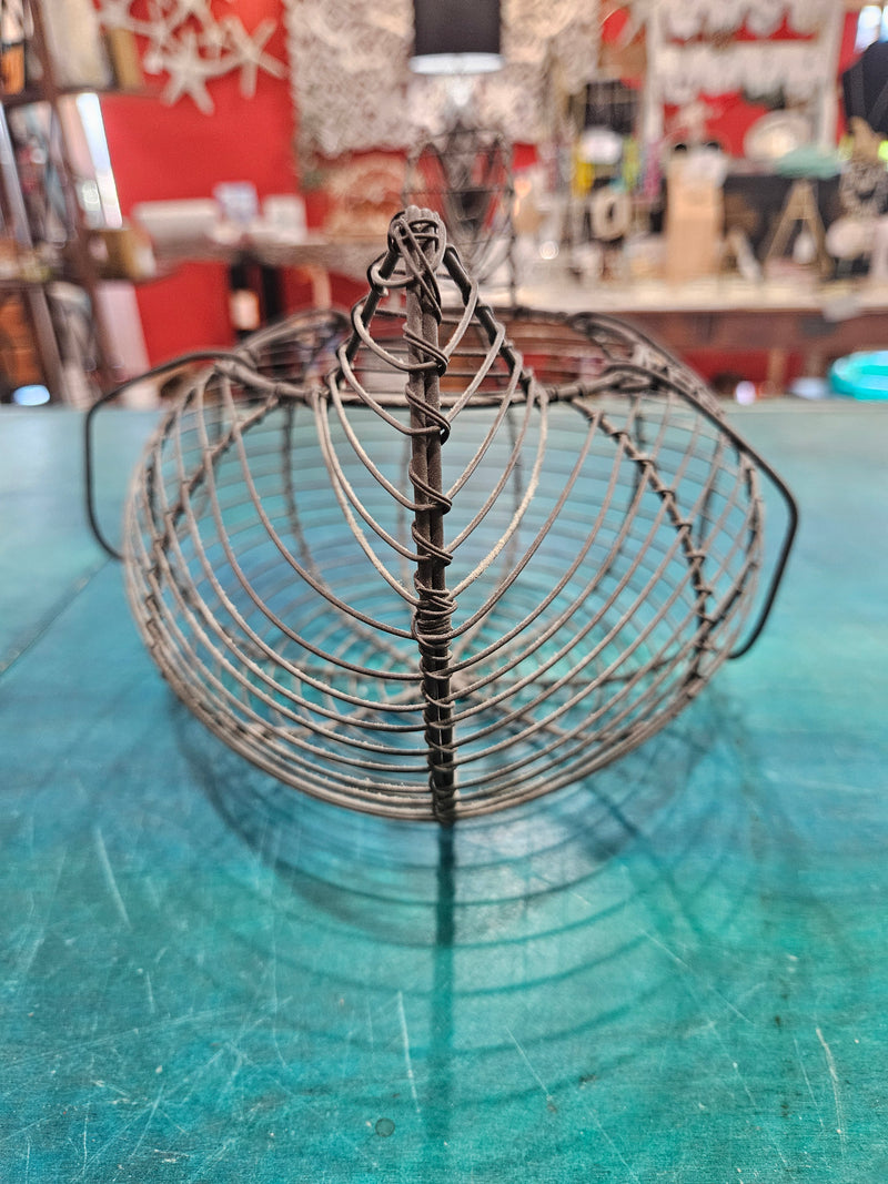 Vintage metal wire egg gathering basket in the shape of a hen, measuring 11.5 inches by 8 inches by 7 inches, ideal for farmhouse decor