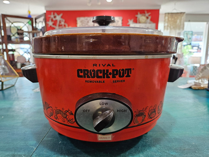 Shop this vintage Orange Rival Crock-Pot model 3350/1, 9" x 11.25". A retro kitchen essential, perfect for cooking or as a decorative piece.