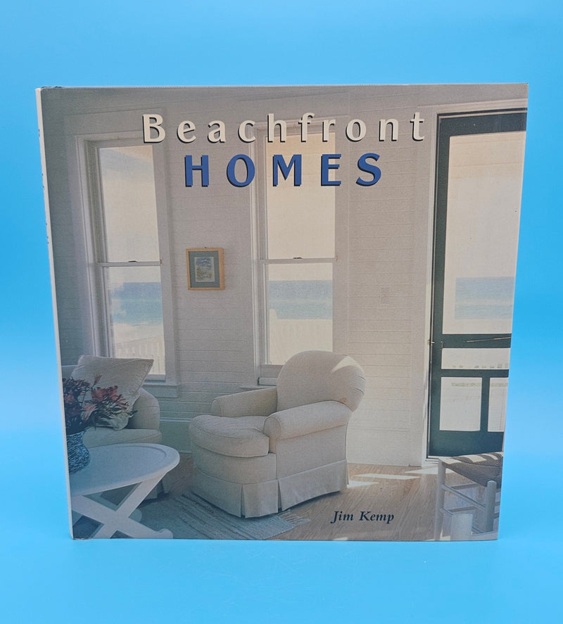 Cover of Beachfront Homes by Jim Kemp featuring bright coastal living room with ocean view through open windows.