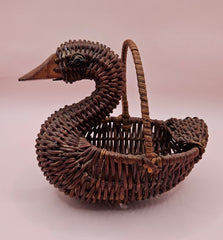 Vintage duck-shaped rattan basket with curved neck and handle, 5x3x4 inches