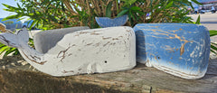 Wooden whale home decor in blue, grey, and white, measuring 14.5 inches by 6 inches, perfect for coastal decor.