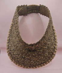 woven palm leaf visors with colorful edge stitching in black, pink, yellow, and light pink