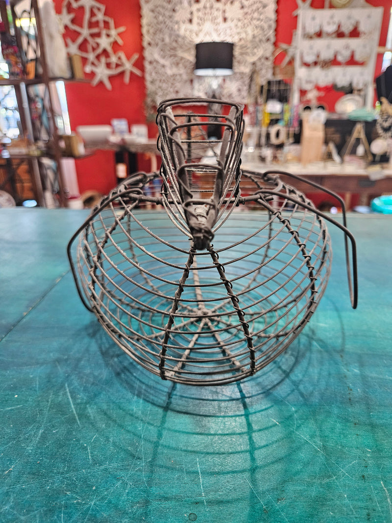 Vintage metal wire egg gathering basket in the shape of a hen, measuring 11.5 inches by 8 inches by 7 inches, ideal for farmhouse decor