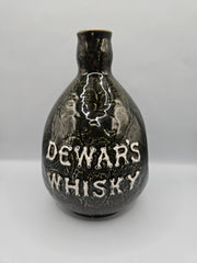  vintage Dewar's Whiskey ceramic decanter, measuring 7.5