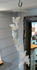Hand-carved onyx bird wind chime with cascading stone birds, 17 inches long – Loving Coastal Living