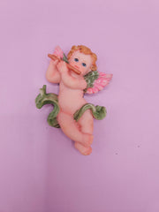 intage angel cherub magnets, each playing different instruments like cymbals, flute, and violin