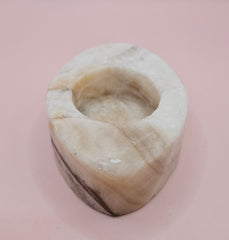 Oval-shaped onyx candle holder in white and brown natural stone, 3.7x2.6x1.2 inches