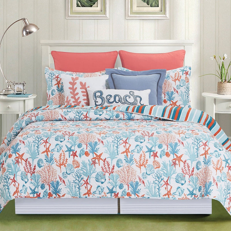 Coastal coral reef quilt and shams in blue and orange