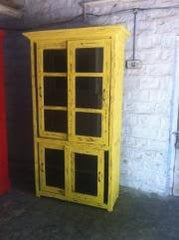 Tall teak display cabinet with storage and vintage yellow wood finish