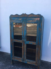 Antique wood cabinet with glass display shelves – coastal inspired décor